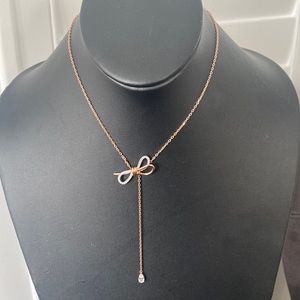 Lifelong Bow necklace
Bow, White, Mixed metal finish